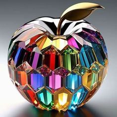 an apple made up of many different colored jewels