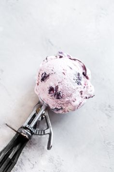 a scoop of ice cream sitting on top of a table