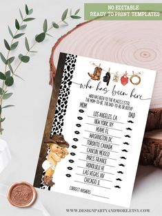 the printable baby shower game is shown next to a tree stump with leaves on it