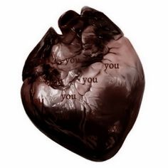 a chocolate heart with words written on it