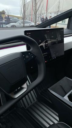 the interior of a car with black and white stripes