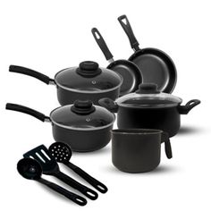 an assortment of pots and pans on a white background