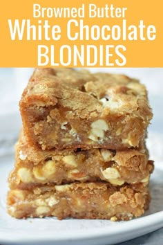 three pieces of white chocolate blondies stacked on top of each other with text overlay