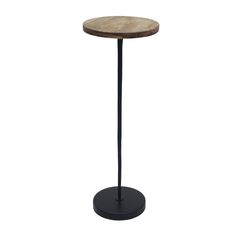 a round wooden table with black metal base on an isolated white background for use as a side table