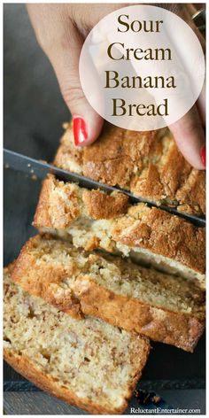 a hand holding a loaf of sour cream banana bread with the words, sour cream banana bread