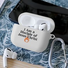 an earphone case with the words i am a disciple of jesus christ printed on it