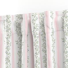 pink and white striped curtains with green leaves on them