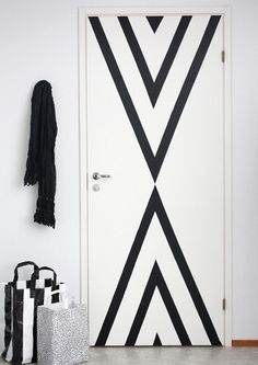 the door is decorated with black and white stripes