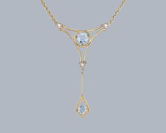 Gorgeous Edwardian aquamarine and seed pearl necklace Beautifully designed this necklace is hand crafted in 15ct gold To the top a fabulous aquamarine set in a triangular frame with a pretty pearl to each corner, with knife edge drop suspending a further aquamarine The stones are on an integral trace link chain fastened with a traditional spring ring clasp This wonderful necklace looks stunning when worn Pendant Drop 4.6cm (1 3/4" ) Aquamarines 5mm & 4mm Pearls 3mm Reverse of pendant marked 15ct Aqua Marine, Seed Pearl, Drop Pendant, Spring Rings, Link Chain, Chain Lengths, Pendant Necklaces, Aquamarine, Jewelry Necklace Pendant