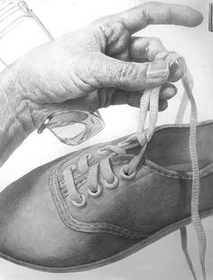 a drawing of an old woman's hand holding a pair of shoes