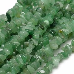 green quartzite beads on white background