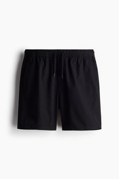 Regular-fit shorts in woven cotton fabric. Drawstring waistband with covered elastic and mock fly. Side pockets and a welt back pocket. Summer Style Cotton Athletic Shorts With Elastic Waistband, Summer Cotton Athletic Shorts With Elastic Waistband, Casual Cotton Swim Trunks With Built-in Shorts, Casual H&m Summer Shorts, High-waisted Cotton Athletic Shorts With Drawstring, Casual Cotton Bottoms From H&m, Casual Black Cotton Swim Trunks, Casual Black Swim Trunks, Relaxed Fit Swim Trunks With Pockets