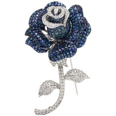 The pin is finly crfted in 18k ehite gold with diamonds weighing approximately total of 4.30 carat and sapphire weighing approximately 70.14 carat. Beautiful and unique pin. Luxury Brooches With Rose Cut Diamonds, Luxury Brooches With Single Cut Diamonds, Luxury Diamond Brooch With Rose Cut Diamonds, Luxury Sapphire Brooch Jewelry, Luxury Brooches With Single Cut Diamonds As Gift, Luxury Sapphire Brooches For Formal Occasions, Luxury Sapphire Brooches For Formal Events, Luxury Sapphire Brooches Gift, Luxury Sapphire Brooches As Gifts