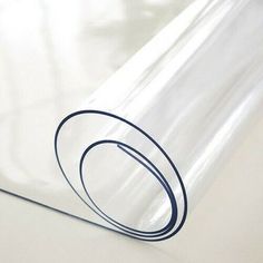 a clear plastic sheet with a black circle on it