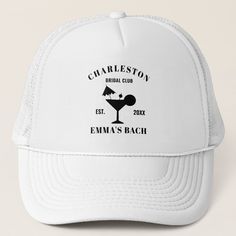 a white trucker hat that says charleston bridal club emma's bach