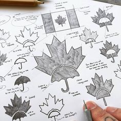 someone is drawing different types of umbrellas on paper