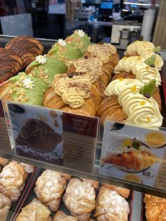 there are many different types of pastries on display