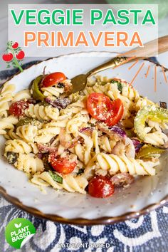 a plate with pasta and vegetables on it