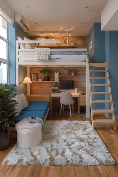 a loft bed with a desk underneath it and stairs leading up to the top floor