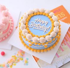 a birthday cake sitting on top of a table