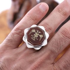 This stunning ring features the iconic double-headed eagle symbol used in the Kurulus Osman series, handcrafted onto a beautiful agate stone. The silver band adds an elegant touch, while the hand-carved eagle symbol on the agate stone makes this ring a true work of art. The agate stone is believed to promote inner stability and calmness, making this ring not only a piece of historical jewelry, but also a meaningful addition to your collection. This ring is perfect for anyone interested in the ri Ottoman Empire Jewelry, Eagle Rings For Men, Osman Bey Ring, Ancient Signet Ring, Eagle Symbol, Turkish Rings, Double Headed Eagle, Eagle Ring, Historical Jewellery