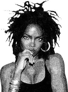 a black and white photo of a woman with dreadlocks