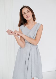 "SIZING & FIT This garment is true to size, and we recommend choosing the size you usually wear. If you want the garment to be loose-fitting, choose a larger size than you usually wear. Before placing an order, check the approximate measurements of the finished garment given below. Model is 5′6″ (170cm) tall with a 80cm/31″ bust, 68cm/26″ waist, 91cm/35″ hip, and she is wearing an XS in ice grey. XXS Length ± 105cm | 41.3\" Bust ± 92cm | 36.2\" Armhole ± 44cm | 17.3\" Hem width ± 134cm | 52. V Neck Linen Dress, Sundress Midi, Gray Summer Dress, Summer Dress Linen, Midi Linen Dress, Linen Dress Summer, Joy Dress, Linen Sundress, Ice Dresses