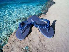 Beautiful handmade beaded sandals for all occasions! I can do any color combinations you may want with sandal colors and bead colors! This one is for a true blue fan! Blue Beaded Adjustable Sandals, Beaded Slip-on Sandals For Summer, Summer Beaded T-strap Open Toe Sandals, Adjustable Beaded Open-toe Sandals, Beaded T-strap Sandals For Beach, Beaded Sandals, True Blue, May 13, Women's Shoes Sandals