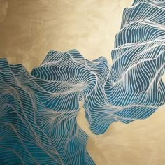 an abstract painting with blue and gold colors on a beige background that has wavy lines in the shape of mountains