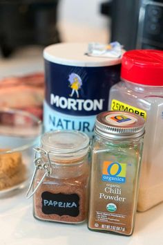 spices and seasonings are sitting on a counter