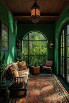 a living room filled with furniture and lots of windows