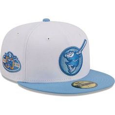 the new era fitted hat features an embroidered blue and white baseball team logo on the front