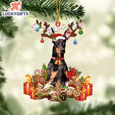 a christmas ornament with a doberman on it