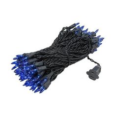 blue and white christmas lights on black wire with plugs for the cord, isolated against a white background