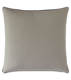 a gray pillow on a white background