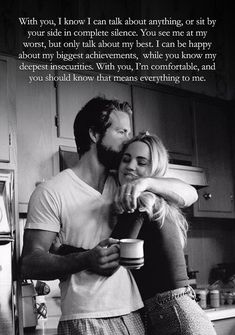 a man and woman hugging each other in the kitchen with text overlaying them