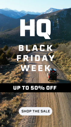 a truck driving down a dirt road with the words black friday week up to 50 % off