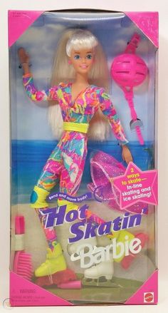 the barbie doll is wearing bright clothes and holding a pink hairbrush in her hand