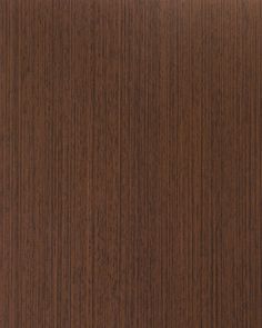 a close up view of the wood grain pattern on this surface, it is dark brown