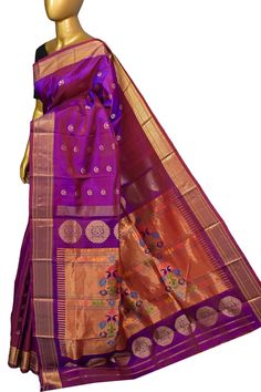 Enhance your saree collection with the latest addition of a Purple and Red Color dual tone Maharani Paithani saree. This exquisite piece features intricate Allover Buti Work, showcasing a beautiful combination of golden zari and traditional motifs such as the chand (moon) and Mor (peacock). Made with traditional handloom techniques, this saree is a timeless investment. Color: A shade of purple and red dual-tone color Technique: Amazing work of golden butta work on the body with traditional paithani design weaving on the pallu Fabric: Paithani Silk Quality: Indyvogue's Assurance of Pure Silk Mark Certified Saree Maharani Paithani, Paithani Saree, Traditional Motifs, Work Online, Color Techniques, Super Sale, Saree Collection, Shades Of Purple, Pure Silk