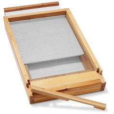 a wooden frame with a mesh screen on top