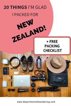 there are many items on the table including a backpack, hat and other things to pack for new zealand