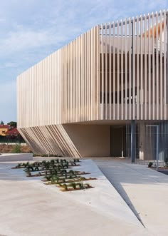 the building is made out of wooden slats