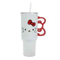 a white cup with a red handle and hello kitty on the side, sitting in front of a white background