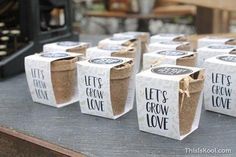 there are many small boxes that say let's grow love