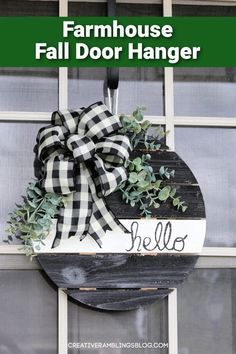 a sign that says farmhouse fall door hanger