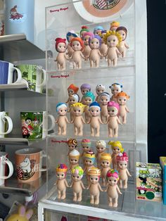 there are many toy figures on display in the case