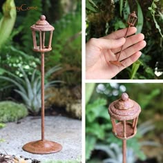 a hand holding a small lamp post in front of some plants and other things around it