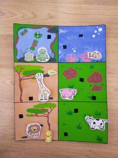 four different pictures of animals and plants on a wooden surface with paper cut outs to make them look like they are playing in the water