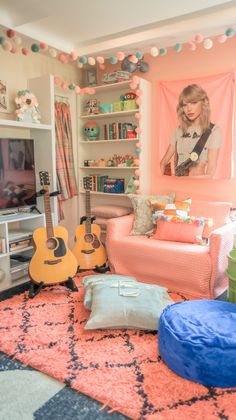 a living room filled with lots of furniture and decor on top of a colorful rug